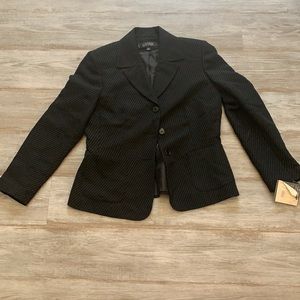 Kasper. 2 piece black suit with a skirt. Size 8p